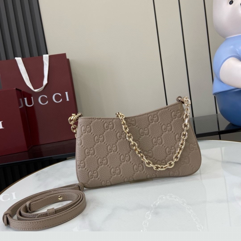 G*u*i satchel bags